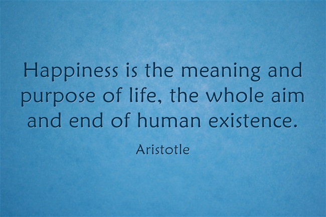 Happiness meaning Quote by Aristotle