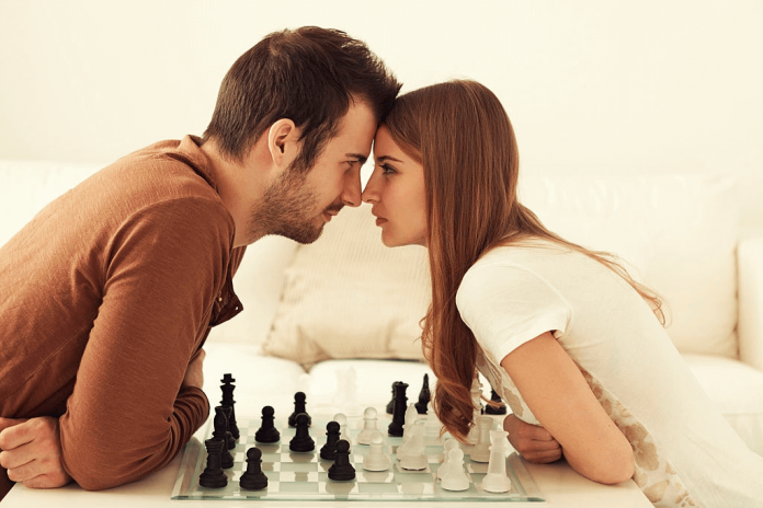 Couple Play Board Game Stay Home Date Ideas